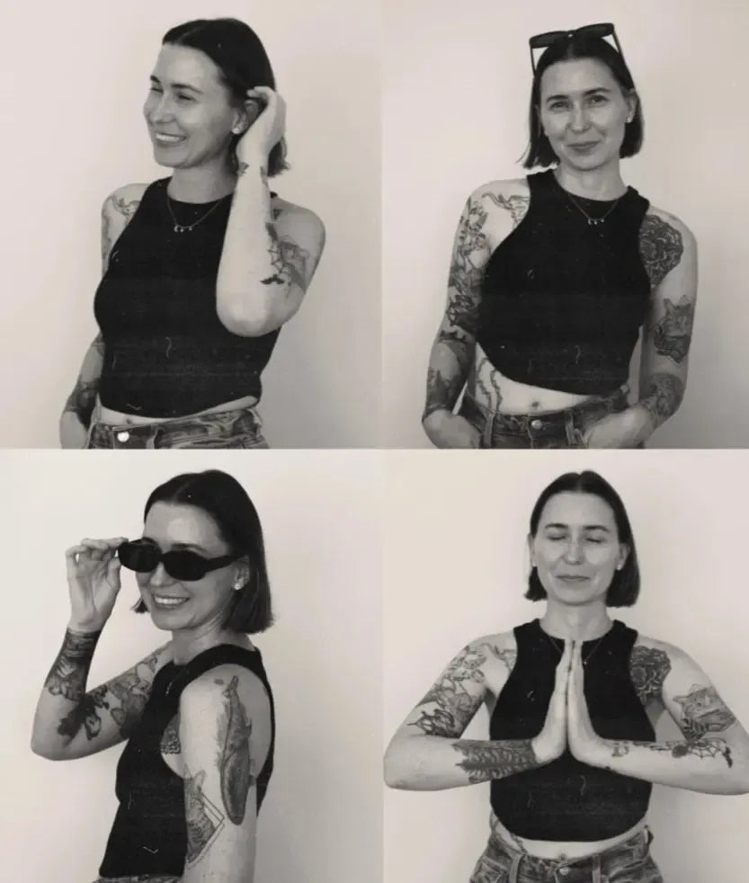Black and white collage of a woman with short hair and tattoos posing in a black tank top and jeans.