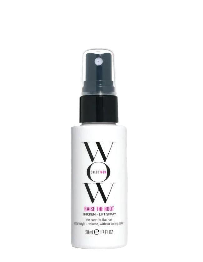 White Color Wow Raise The Root travel-size spray bottle with black cap and pink accents.