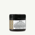 Davines Alchemic Conditioner Chocolate, dark brown jar with black ribbed lid and patterned label.