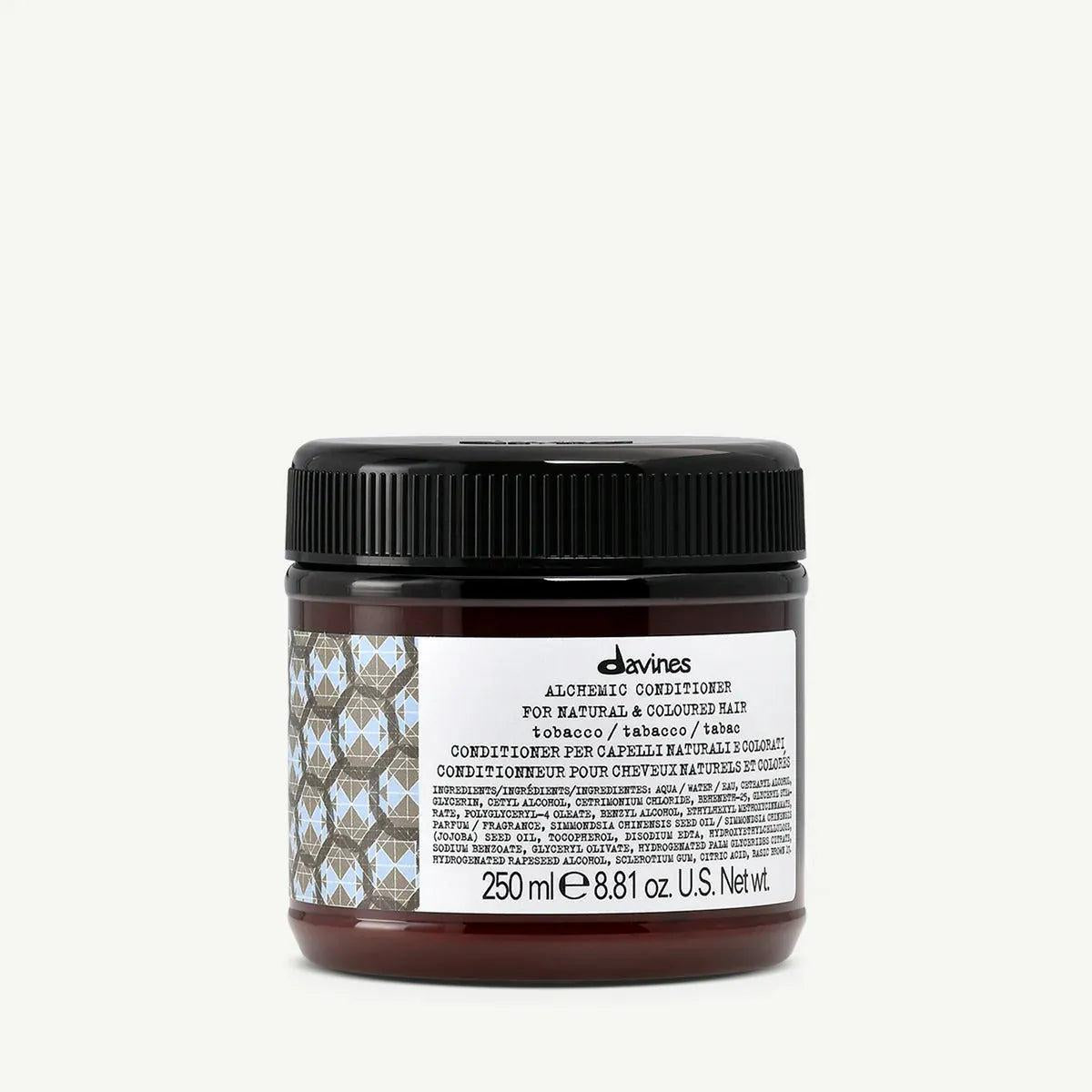 Davines Alchemic Conditioner Tobacco in a dark amber jar with a black ribbed lid and white label.
