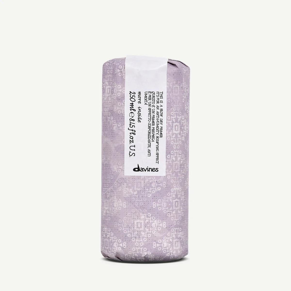 Davines Blowdry Primer, 250ml, in a light purple patterned cylindrical package with a white label.