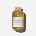 Davines DEDE Delicate Shampoo, 250ml, in a clear amber bottle with a white label and clear cap.