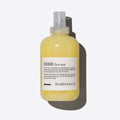 Davines DEDE Leave-In Mist, a 250ml yellow bottle with a clear spray top and white label.