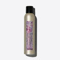 Davines Dry Texturizer, 250ml gold aerosol can with a black cap and purple floral label.