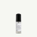 Davines Liquid Spell 50ml bottle with clear body, black cap, and white label.