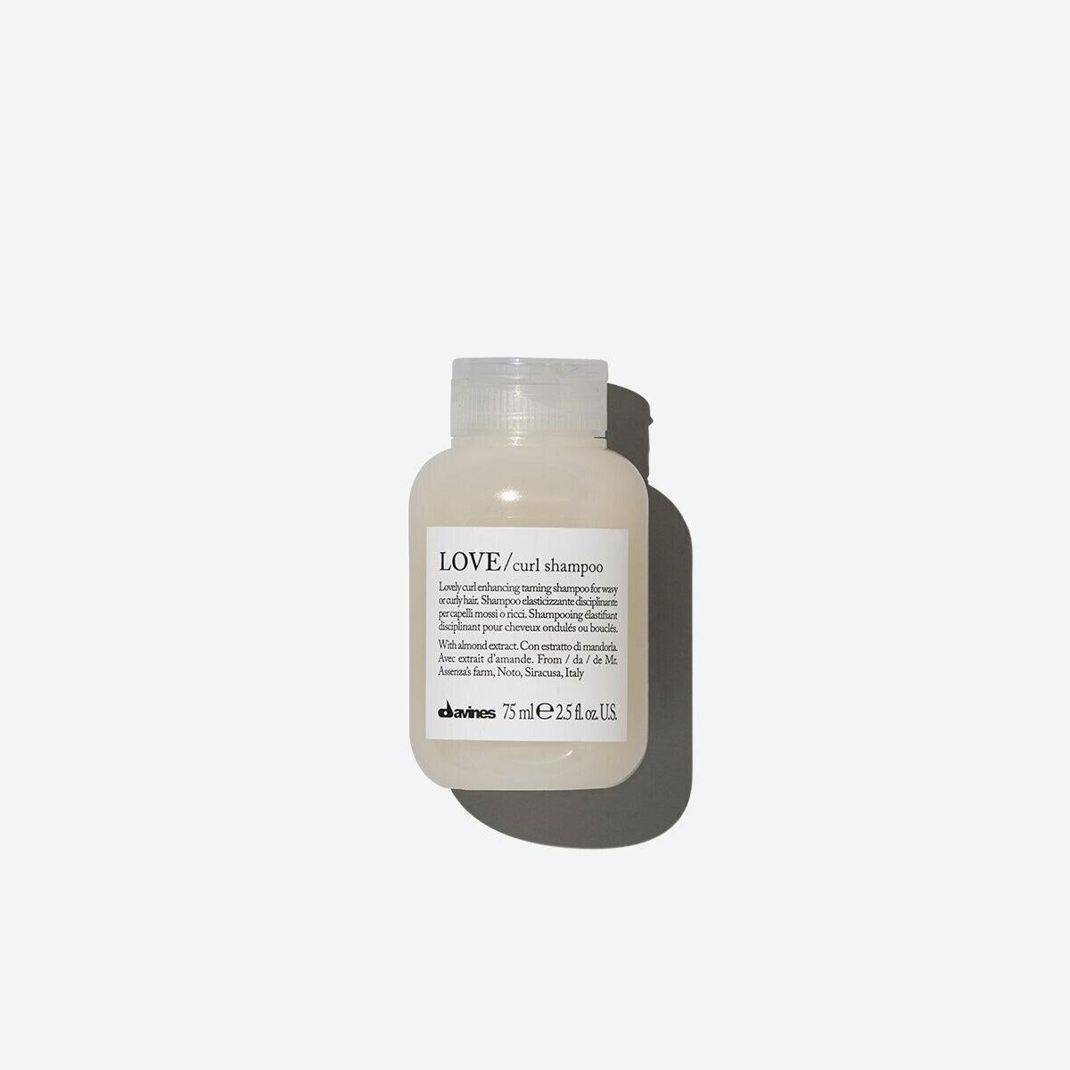 Davines LOVE Curl Shampoo, 75ml, in a small, translucent white bottle with a clear cap.