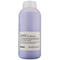 Davines LOVE Smooth Conditioner, 1000ml light purple bottle with white cap and label.