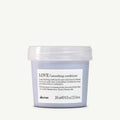 Davines LOVE Smooth Conditioner in a light purple 250ml tub with a clear lid.