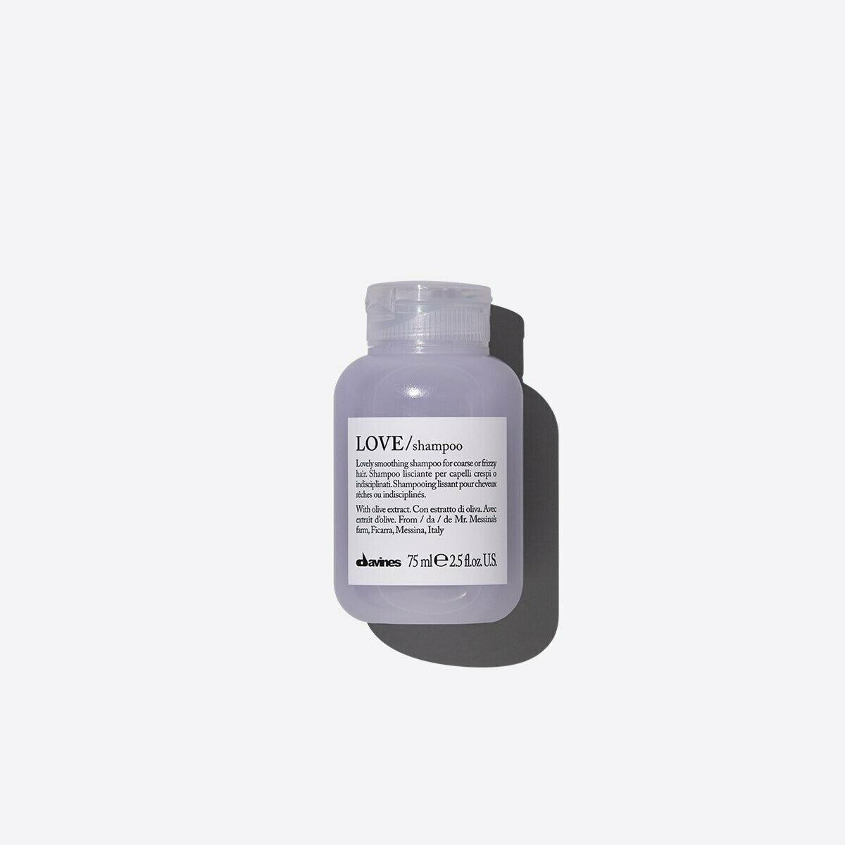 Davines LOVE Smooth Shampoo, 75ml, in a small, light purple bottle with a clear cap.
