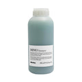 Davines MINU Shampoo 1000ml bottle with light blue liquid and white cap, featuring a minimalist label.