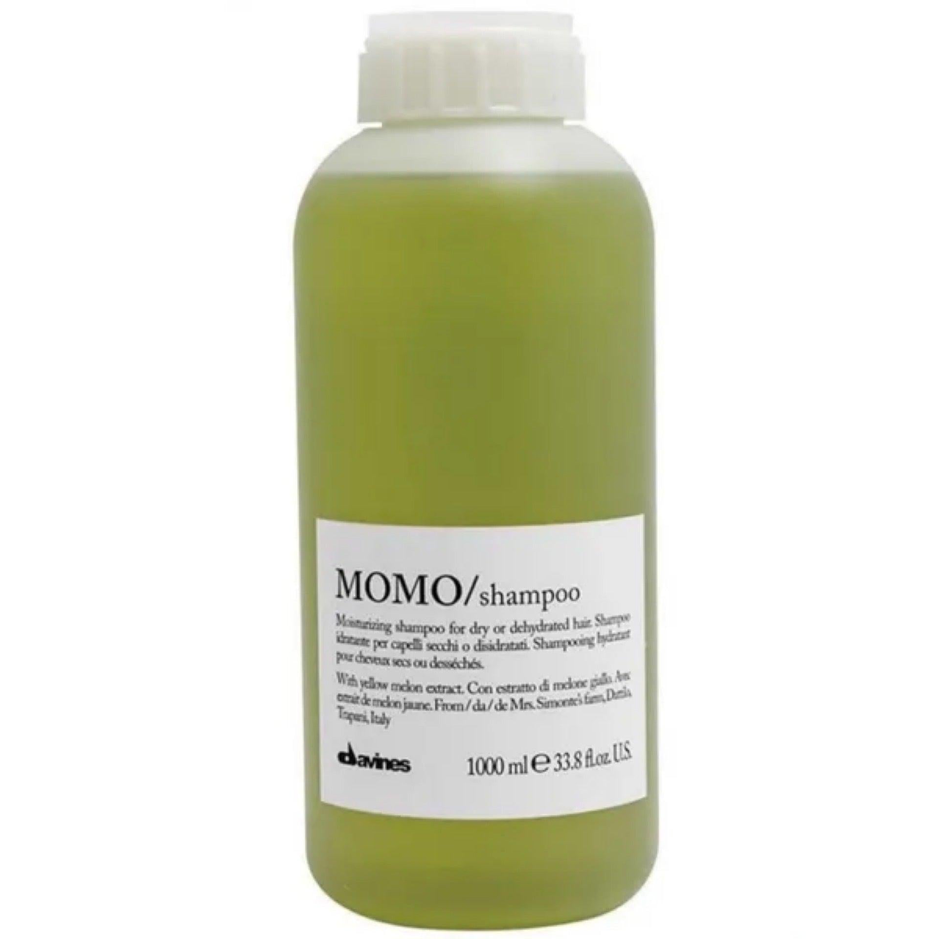 Davines MOMO Shampoo, 1000ml, in a translucent green bottle with a white screw cap and label.