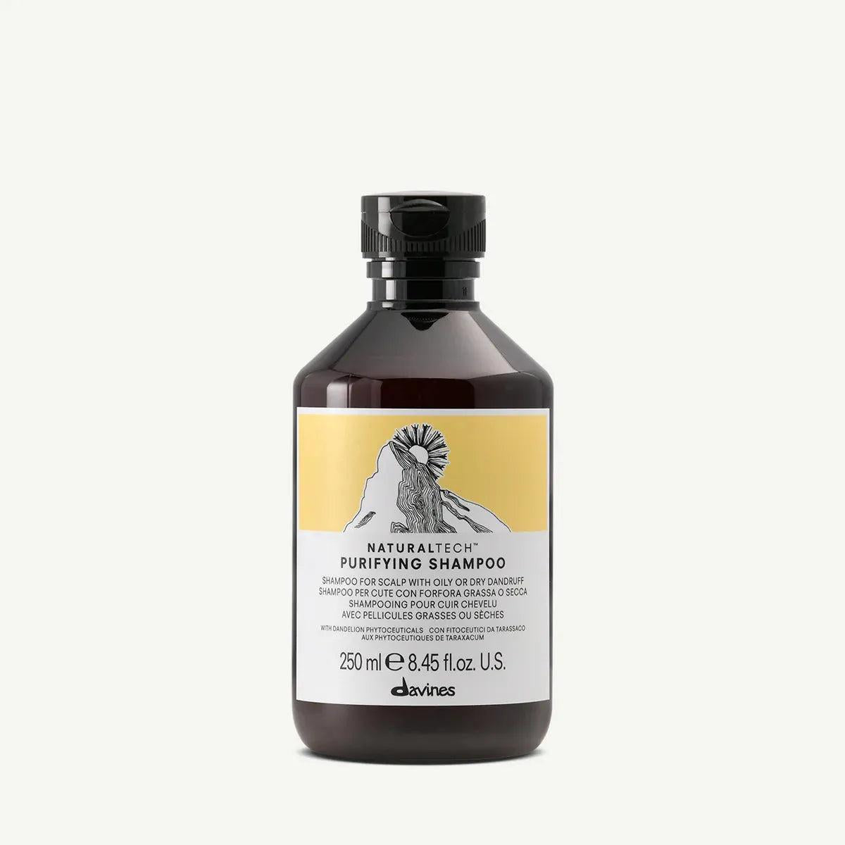 Davines NaturalTech Purifying Dandruff Shampoo, 250ml dark amber bottle with black cap and yellow label featuring a mountain graphic.