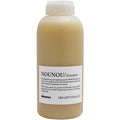 Davines NOU NOU Shampoo, 1000ml, in a light beige bottle with a white cap and label.