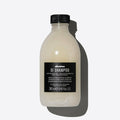 Davines OI Shampoo, 280ml, in a translucent white bottle with a black cap and label.