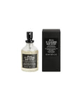 Davines OI Silkening Hair Scent: clear 50ml glass spray bottle with black cap next to its matte black box.