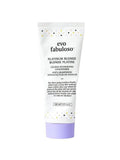 White Evo Fabuloso Platinum Blonde conditioner tube with a purple cap and colorful polka dots.