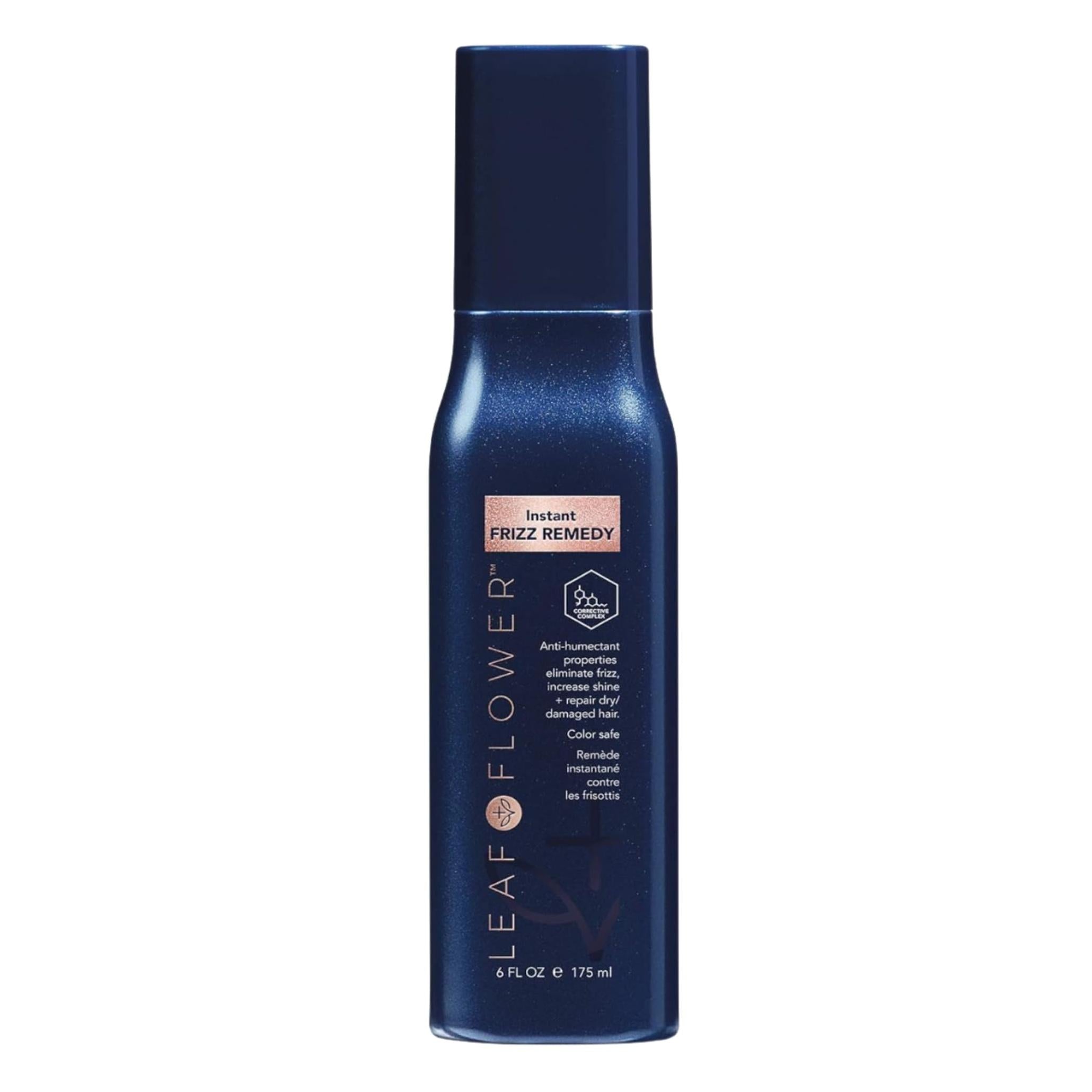 Leaf & Flower Instant Frizz Remedy, a dark blue 6 fl.oz bottle with a pump top and pink label.