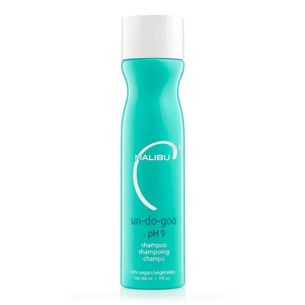 Malibu Un-Do-Goo Shampoo, 9 oz, in a curved teal bottle with a white cap.