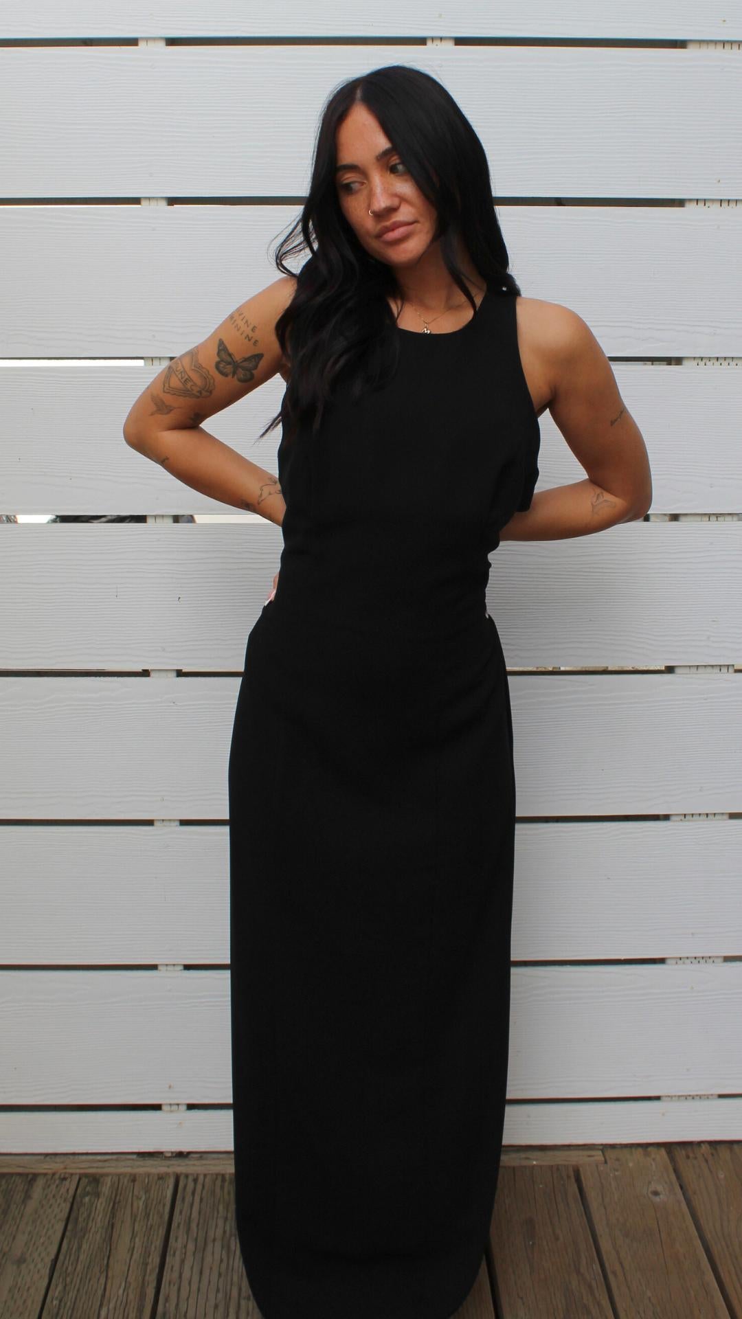 Rampage long black dress, size S, with a sleek open-back cutout.