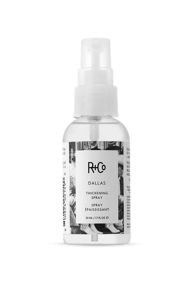 R+Co Dallas Thickening Spray MINI, a clear 1.7 fl.oz bottle with white spray top and black and white label.