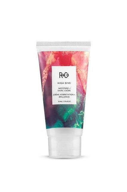 R+Co High Dive Moisture & Shine Creme MINI tube with vibrant red and teal abstract design.