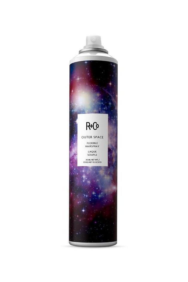 R+Co Outer Space Flexible Hairspray in a 9.5 oz can with a vibrant galaxy design and white label.