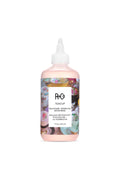 R+Co Teacup Peachouli + Kombucha Detox Rinse in a 6 fl.oz light pink bottle with a white nozzle and teacup label.