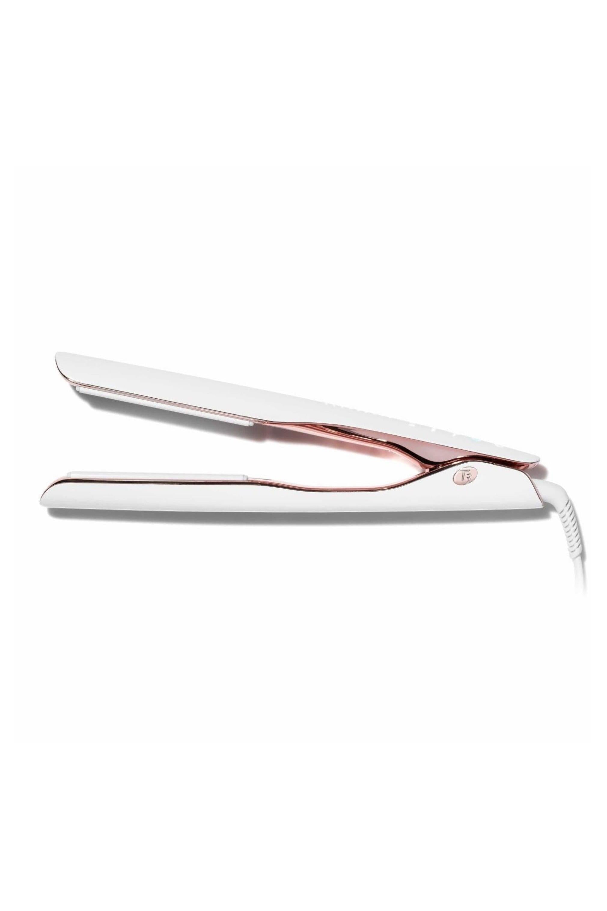 White T3 Lucea ID 1" flat iron with rose gold accents and a smart touch interface.
