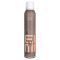 Wella DRY ME Dry Shampoo, 4.22 oz/119g, in a matte brown aerosol can with a white cap.